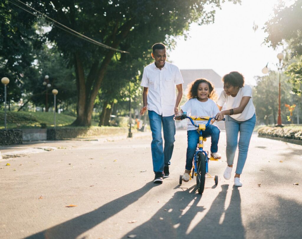 Family Laughing Together Outdoors